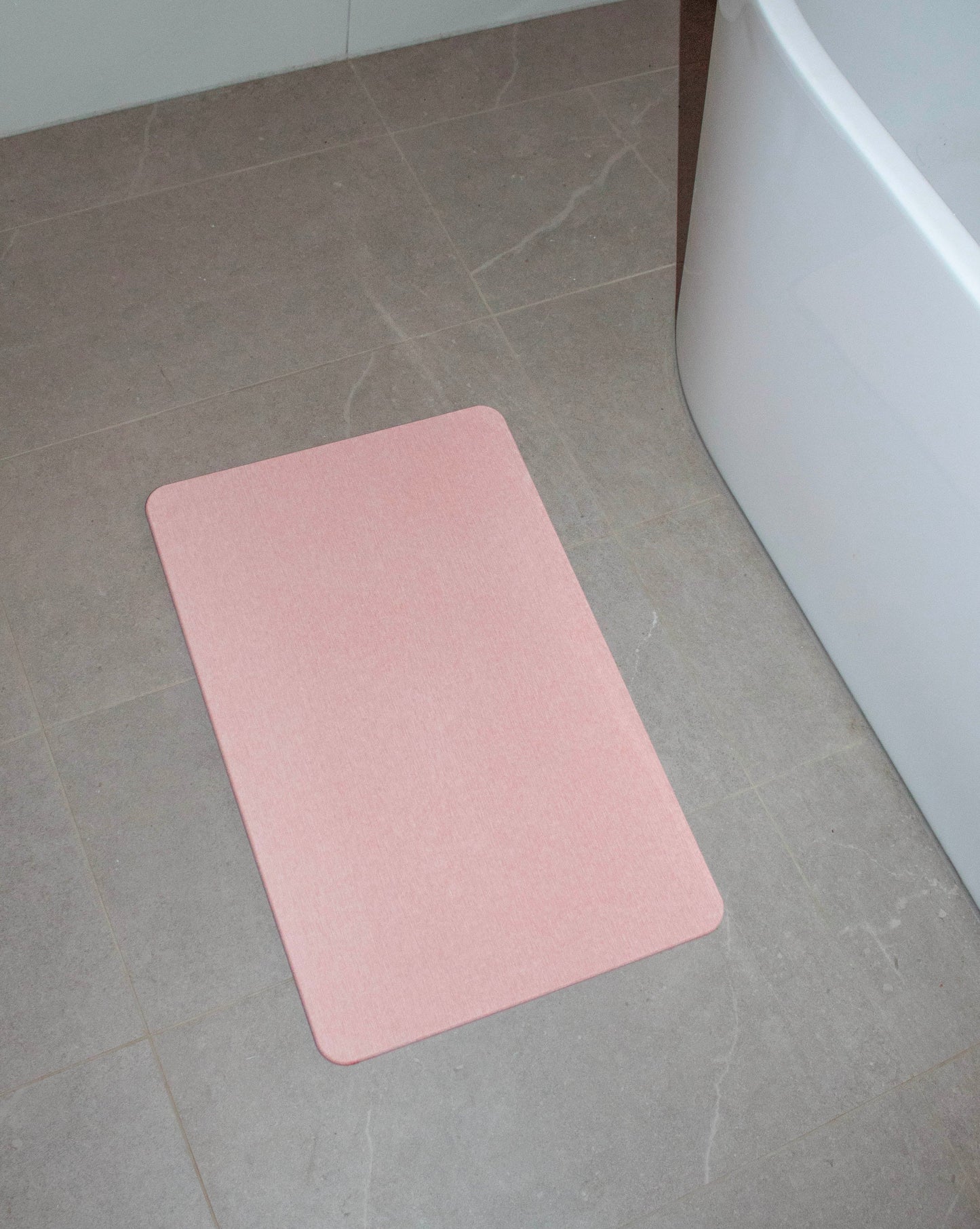 Eco-friendly diatomaceous bath mat with fast-drying surface for bathrooms