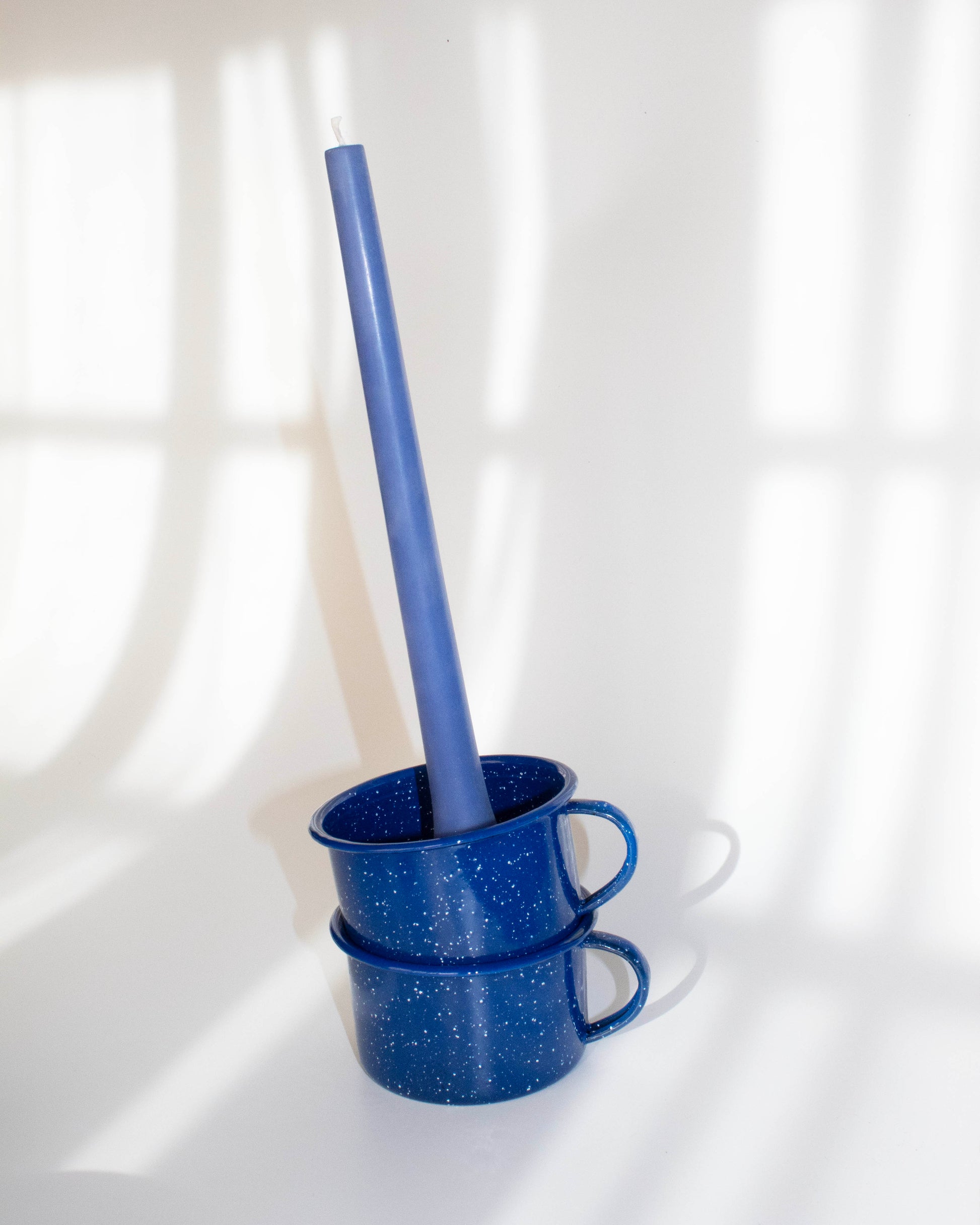 Durable enamel-plated mug with a glossy finish, perfect for camping and daily use